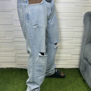 Knee ripped stone wash blue , baggy jean